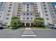 Beautiful condo building entrance with meticulous landscaping and convenient parking at 2825 Terra Ceia Bay Blvd # 1504, Palmetto, FL 34221