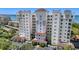 Upscale condo building with tile roof, balconies, and water view from multiple residences at 2825 Terra Ceia Bay Blvd # 1504, Palmetto, FL 34221