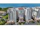 Upscale condo building with tile roof, balconies, and water view from multiple residences at 2825 Terra Ceia Bay Blvd # 1504, Palmetto, FL 34221