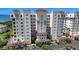 Upscale condo building with tile roof, balconies, and water view from multiple residences at 2825 Terra Ceia Bay Blvd # 1504, Palmetto, FL 34221