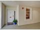 Inviting condo entrance features a white door with a glass panel and a cute welcome mat at 2825 Terra Ceia Bay Blvd # 1504, Palmetto, FL 34221