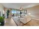 Bright living room boasts tile floors, ceiling fan, and access to a private balcony at 2825 Terra Ceia Bay Blvd # 1504, Palmetto, FL 34221