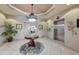 Elegant lobby featuring chandelier, tile floors, elevator, and decorative plants at 2825 Terra Ceia Bay Blvd # 1504, Palmetto, FL 34221