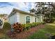 House exterior with landscaping and a lawn at 351 46Th N Ave, St Petersburg, FL 33703