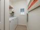 Laundry room with washer, dryer, and storage at 351 46Th N Ave, St Petersburg, FL 33703