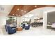 Community space with comfortable seating and dining area at 411 E Shore Drive # 203, Clearwater Beach, FL 33767