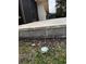 Detail of the patio edge showing retaining wall and irrigation at 4329 Marine Parkway, New Port Richey, FL 34652