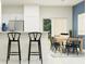 Open concept kitchen and dining area with modern furnishings at 5190 Meyer Bessie St, Zephyrhills, FL 33541