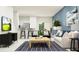 Open living room featuring modern furniture and a neutral color scheme at 5190 Meyer Bessie St, Zephyrhills, FL 33541