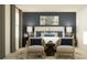 Serene main bedroom with a king-size bed and relaxing atmosphere at 5190 Meyer Bessie St, Zephyrhills, FL 33541