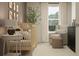 Bedroom featuring crib, armchair, and dresser at 5210 Meyer Bessie St, Zephyrhills, FL 33541