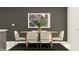 Modern dining room with a wooden table and six chairs at 5210 Meyer Bessie St, Zephyrhills, FL 33541