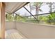 Private balcony overlooking lush trees and greenery at 5340 Cobblestone Ct, Wesley Chapel, FL 33543