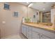 Double vanity bathroom with granite countertops at 5340 Cobblestone Ct, Wesley Chapel, FL 33543