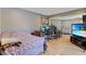 Bedroom with built in desk and mirrored closet at 5340 Cobblestone Ct, Wesley Chapel, FL 33543