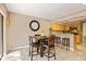 Bright dining area with table and four chairs near kitchen at 5340 Cobblestone Ct, Wesley Chapel, FL 33543