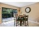 Casual dining area with sliding glass doors to backyard at 5340 Cobblestone Ct, Wesley Chapel, FL 33543