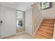 Inviting entryway with staircase and view to backyard at 5340 Cobblestone Ct, Wesley Chapel, FL 33543