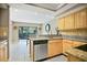 Modern kitchen with stainless steel appliances and granite countertops at 5340 Cobblestone Ct, Wesley Chapel, FL 33543
