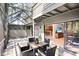 Screened-in patio with seating area and view of the living area at 5340 Cobblestone Ct, Wesley Chapel, FL 33543