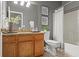 Clean bathroom with single vanity and bathtub at 535 52Nd N Ave, St Petersburg, FL 33703