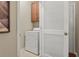 Laundry room with washer, dryer and cabinets at 535 52Nd N Ave, St Petersburg, FL 33703