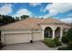 Attractive single-story home with tile roof and two-car garage at 5571 Rock Dove Dr, Sarasota, FL 34241