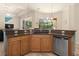 Kitchen features granite counters and stainless steel appliances at 5571 Rock Dove Dr, Sarasota, FL 34241
