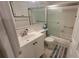 Clean bathroom featuring a shower with sliding glass doors and a white vanity at 5880 38Th N Ave # 204, St Petersburg, FL 33710