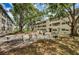 A community courtyard provides residents with an outdoor gathering spot that includes picnic tables and chairs at 5880 38Th N Ave # 204, St Petersburg, FL 33710