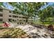 A nice community patio and grilling area invite residents to socialize and enjoy the outdoor spaces at 5880 38Th N Ave # 204, St Petersburg, FL 33710