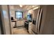 Clean kitchen featuring stainless steel appliances, granite countertops, and white cabinets at 5880 38Th N Ave # 204, St Petersburg, FL 33710