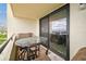 Private balcony with seating and stunning water views at 5915 Sea Ranch Dr # 308W, Hudson, FL 34667