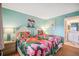 Twin bedroom with ensuite bathroom access at 5915 Sea Ranch Dr # 308W, Hudson, FL 34667