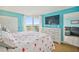 Bedroom with water views, king bed, and large TV at 5915 Sea Ranch Dr # 308W, Hudson, FL 34667