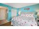 Bright bedroom with king-size bed and access to bathroom at 5915 Sea Ranch Dr # 308W, Hudson, FL 34667