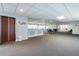 Spacious community room with a bar and seating at 5915 Sea Ranch Dr # 308W, Hudson, FL 34667
