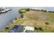 Relaxing outdoor seating area with benches near waterfront at 5915 Sea Ranch Dr # 308W, Hudson, FL 34667