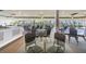 Community dining area with many tables and chairs at 5915 Sea Ranch Dr # 308W, Hudson, FL 34667