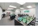 Game room with foosball, pool table, and seating area at 5915 Sea Ranch Dr # 308W, Hudson, FL 34667