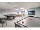 Community game room with pool table and air hockey at 5915 Sea Ranch Dr # 308W, Hudson, FL 34667