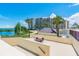 Community patio with seating area and waterfront view at 5915 Sea Ranch Dr # 308W, Hudson, FL 34667