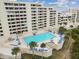 Aerial view of community pool and building at 5915 Sea Ranch Dr # 308W, Hudson, FL 34667