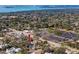 Aerial view showing a single-Gathering home's location near the water and local businesses at 6923 Dartmouth N Ave, St Petersburg, FL 33710