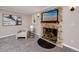 Stone fireplace with a brass screen and mantel at 6923 Dartmouth N Ave, St Petersburg, FL 33710