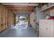 Attached garage with laundry area and extra storage at 6923 Dartmouth N Ave, St Petersburg, FL 33710