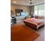 Bright bedroom with comfortable bed and built-in workspace at 700 Beach Ne Dr # 401, St Petersburg, FL 33701