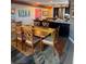 Open concept dining area with modern light fixture at 700 Beach Ne Dr # 401, St Petersburg, FL 33701