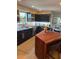 Modern kitchen featuring stainless steel appliances and a live edge island at 700 Beach Ne Dr # 401, St Petersburg, FL 33701