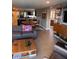 Open concept living room with views into kitchen and dining areas at 700 Beach Ne Dr # 401, St Petersburg, FL 33701